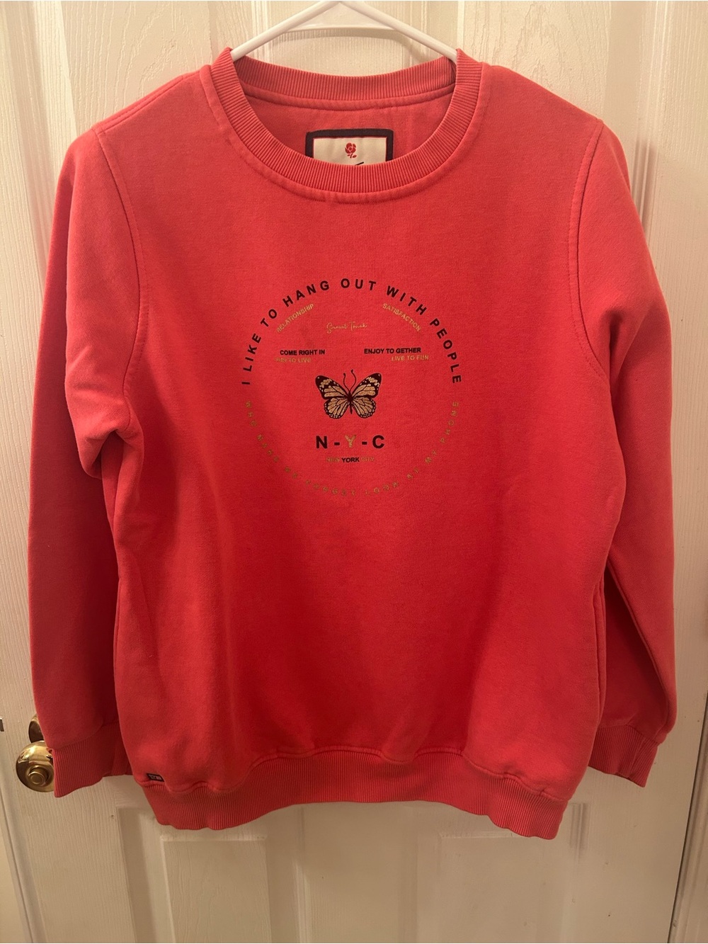 Kids Coral Pullover Sweatshirt with Butterfly Graphic